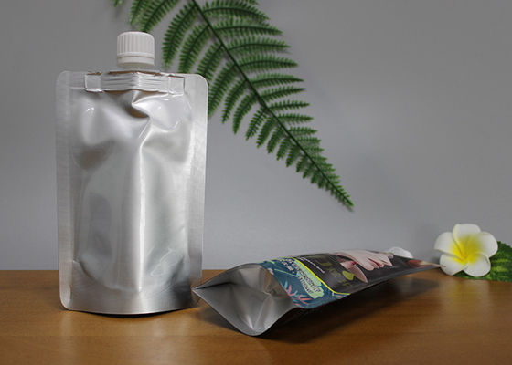 注文の液体ジュースのための口が付いているハンドルによって薄板にされるDoypackのパッキング袋
